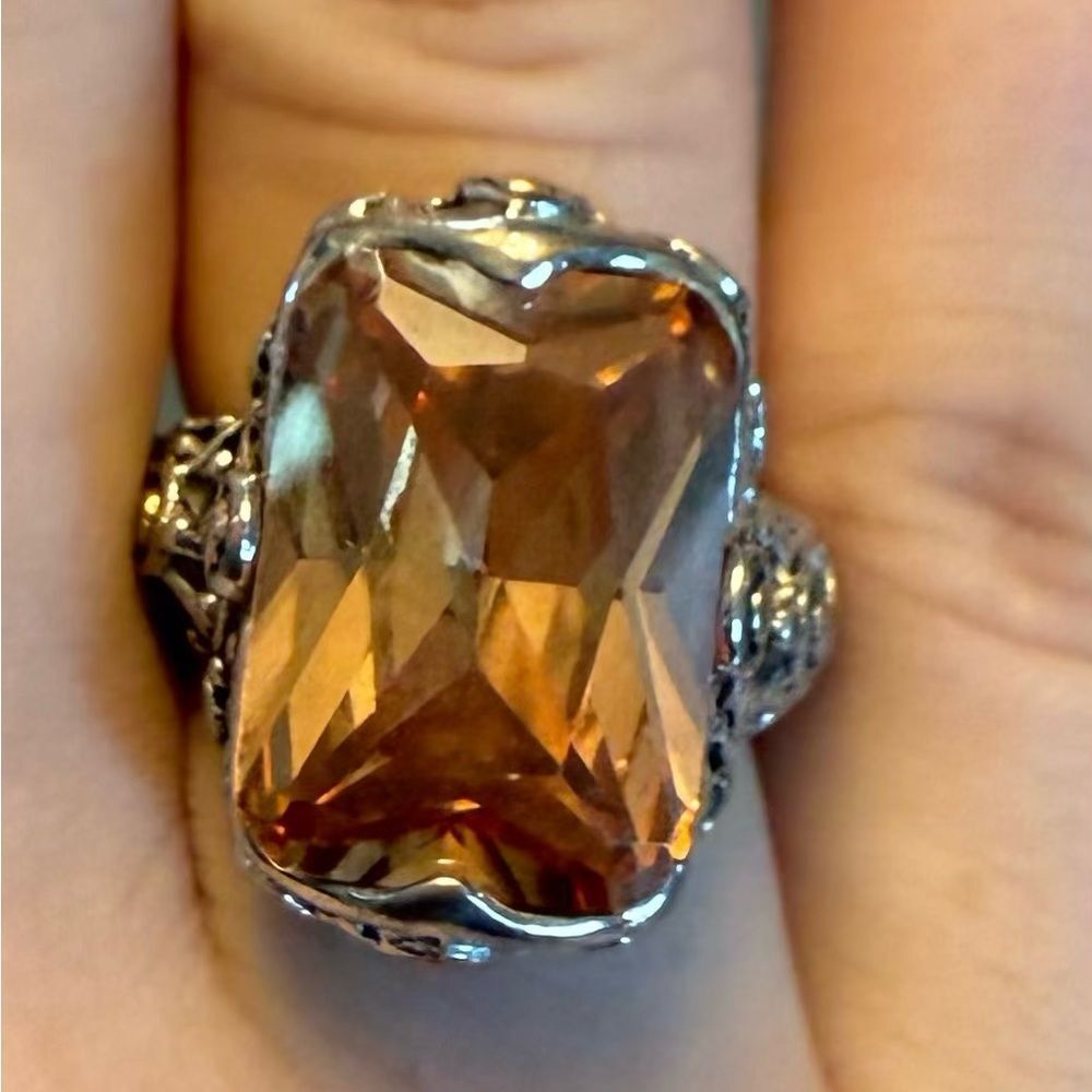 Gemstone Ring with Faceted Cut Topaz colored CZ .